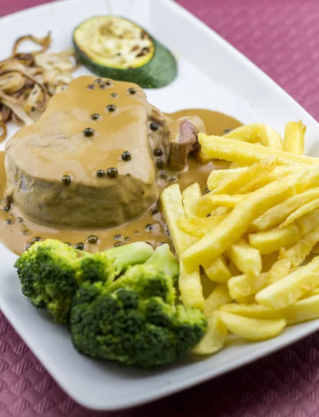 Closeup Chips Fries Meat Broccoli Plate — Stock Photo, Image