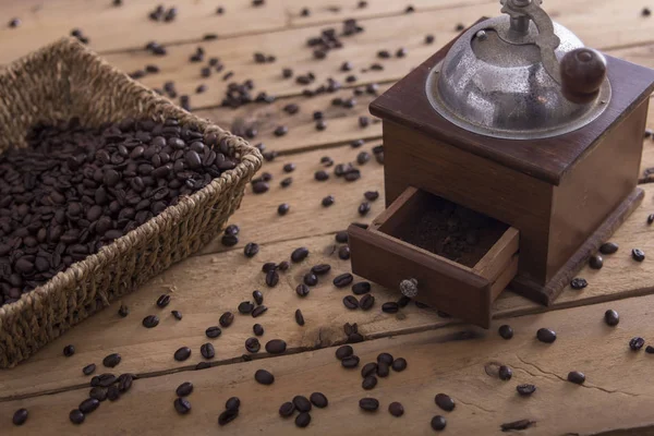 Roasted coffee beans in vintage coffee grinder