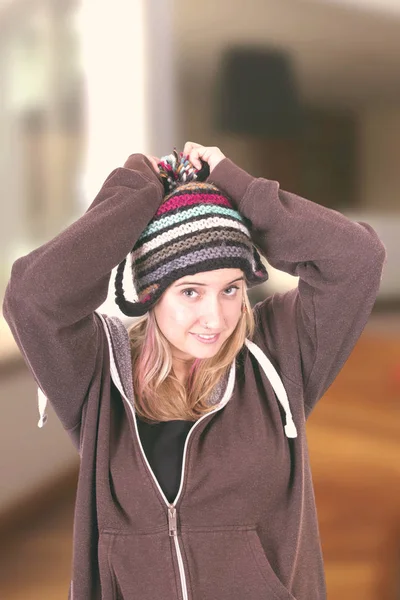 Woman Wearing Warm Hat Bonnet Touching Head Looking Camera — Stock Photo, Image