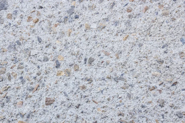 grey cement with stones, ground pavement