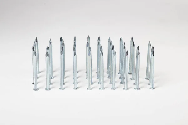 Metallic Steel Spikes Pins Isolated White — Stock Photo, Image