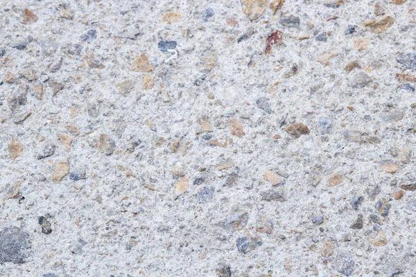 grey cement with stones, ground pavement