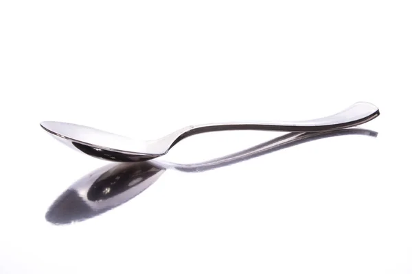 Metallic Spoon White Surface Reflection — Stock Photo, Image