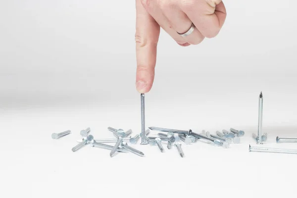 Person Hand Steel Nails Set Closeup — Stock Photo, Image