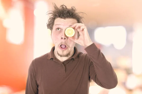 Young Guy Having Fun Lemon Eye — Stock Photo, Image