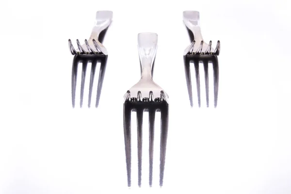 Three Metallic Forks Mirror Surface — Stock Photo, Image