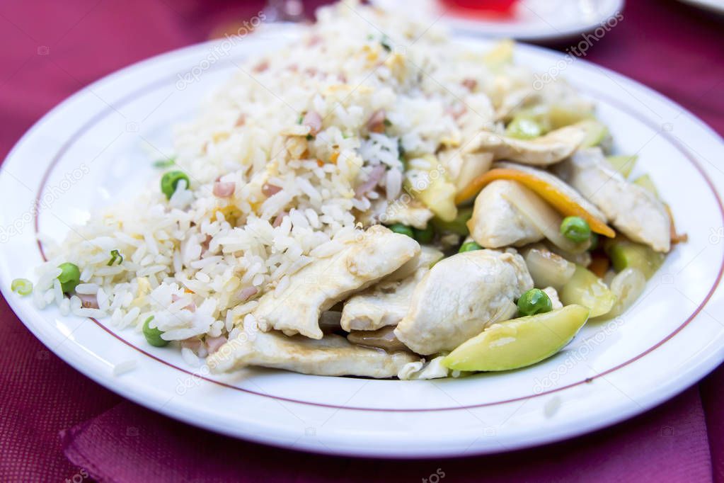 delicious dish with chicken and vegetables on plate