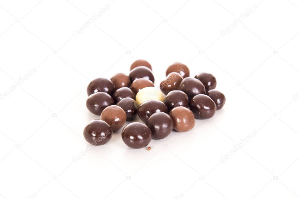 Chocolate balls candies isolated on white