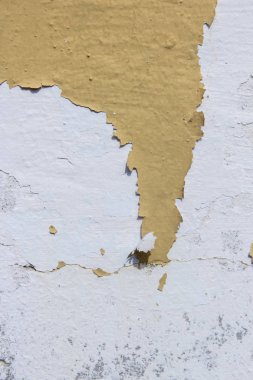 terk edilmiş yıpranmış gri duvar doku bina sarı 