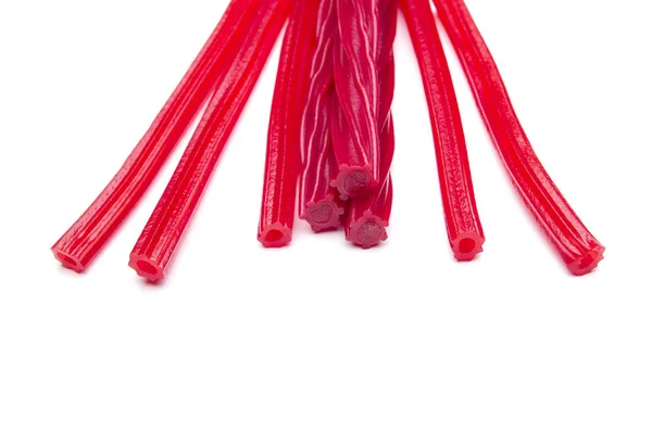 Sakızlı Şekerli Kırmızı Sopa Üzerinde Beyaz Tatlı Tatlı Şekerler Izole — Stok fotoğraf