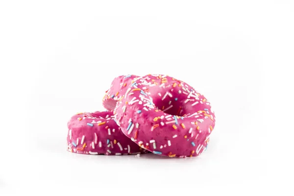 Zoete Dessert Donuts Gekleurde Roze Kleur Geïsoleerd Wit Studio — Stockfoto