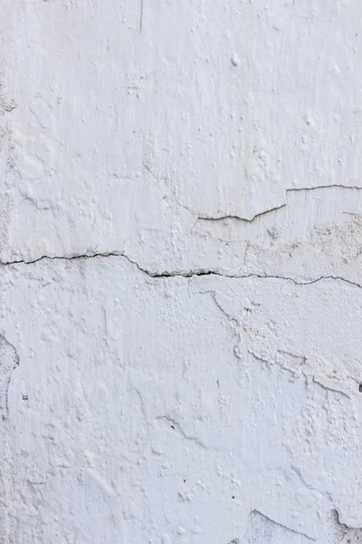 cracked cement stucco building wall surface