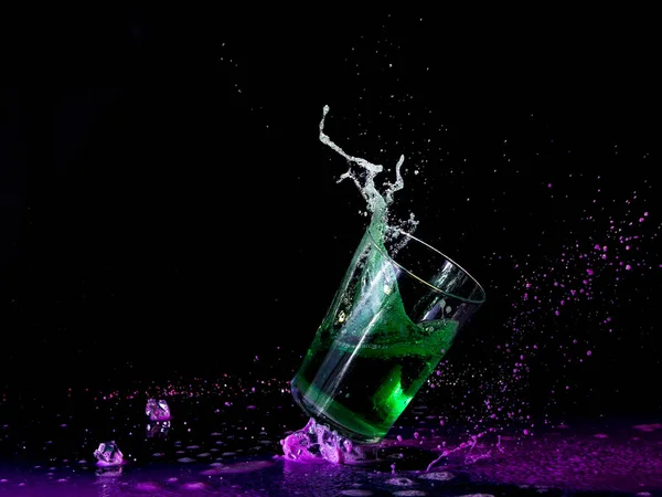Black Background Falling Glass Green Liquid — Stock Photo, Image
