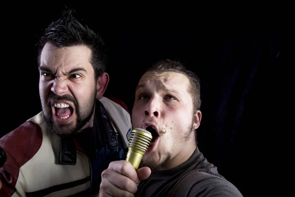 Two Crazy Musicians Men Screaming Microphones Dark Room — Stock Photo, Image