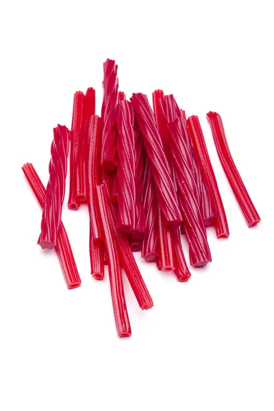 Zuckerhaltige Leuchtend Rote Süßholzstäbchen Isoliert Auf Weiß Kopierraum — Stockfoto