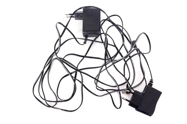 Two Black Battery Charger Cables Isolated White Top View — Stock Photo, Image