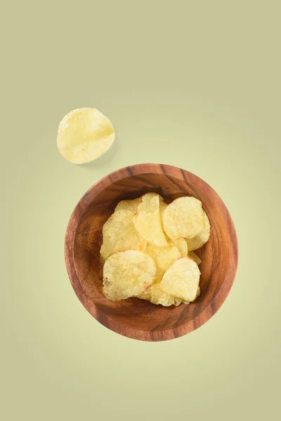Top view of bowl with potato chips isolated — Stock Photo, Image