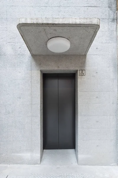 elevator or lift on stone wall