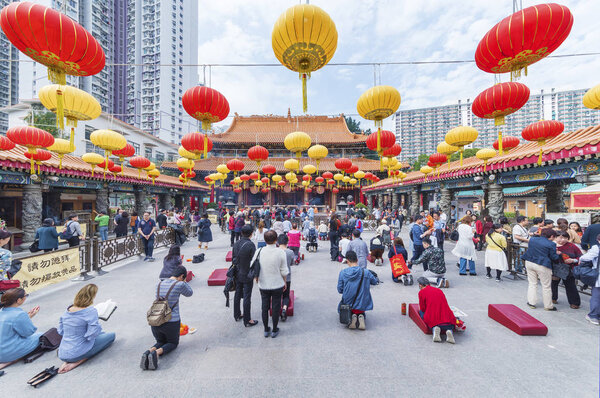 Hong Kong, China - March 01, 2018 : Tourist visiting Wong Tai Sin Temple in Kowloon in Hong Kong city