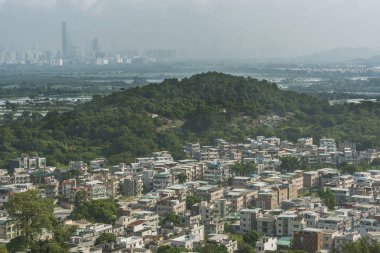 Hong Kong ve Shenzh manzarası Yuen uzun İlçesi'nde köy