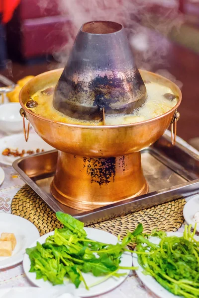 Hot pot on the table — Stock Photo, Image