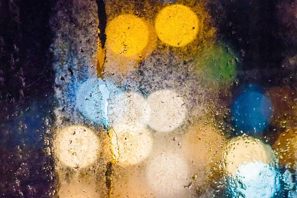 Rain drops on window in night — Stock Photo, Image