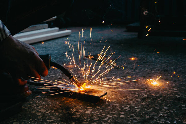 bright sparks from semi-automatic welding