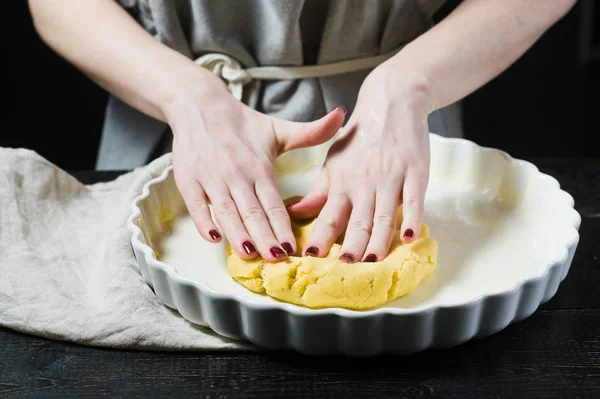 Chef Rolls Out Dough Baking Dish Cooking Side View Black — Stock Photo, Image
