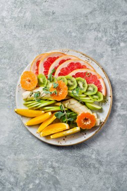 Meyve plaka, greyfurt, mandalina, kivi, portakal, muz, elma.