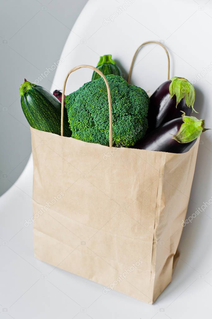 Fresh vegetables in bio eco paper bag. Zero waste shopping conce