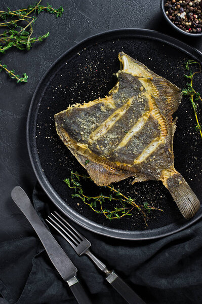 Grilled flounder, balanced healthy food. Gray background, top view, space for text.