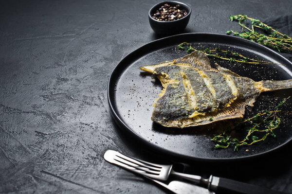 Grilled flounder. Gray background, top view, space for text.
