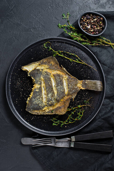 Grilled flounder, balanced healthy food. Gray background, top view, space for text.