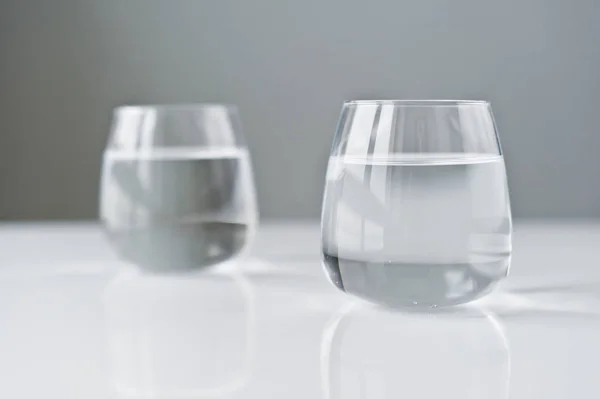 Two glasses of clear water. — Stock Photo, Image