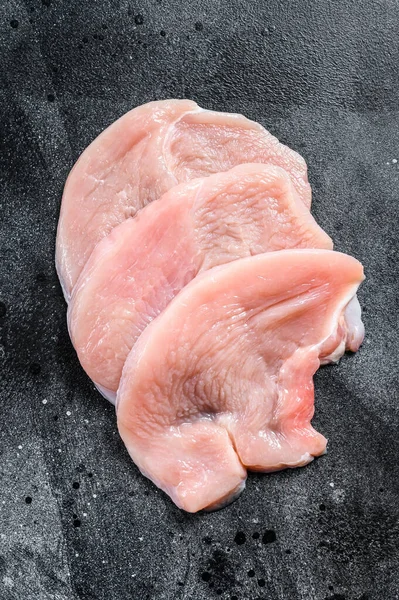Rohe Truthahnsteaks Bio Geflügelfleisch Schwarzer Hintergrund Ansicht Von Oben — Stockfoto