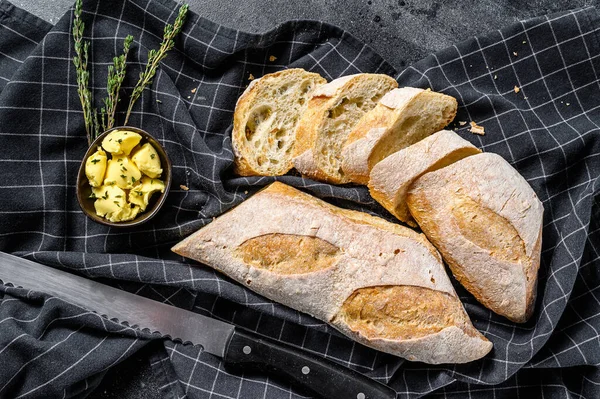 Artisanal Baguettes Cut Slice Butter Black Background Top View — Stock Photo, Image