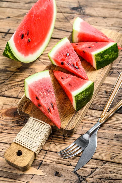 Slices Red Striped Watermelon Wooden Background Top View — Stock Photo, Image