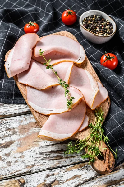 Smoked meats, sliced smoked pork loin. White background. Top view.