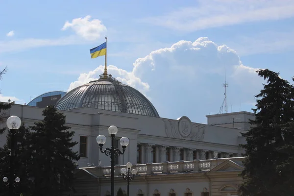 The Ukrainian Parliament with a Ukrainian flag on the roof Stock Picture