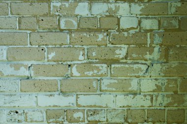 Eski beyaz tuğla. Tuğla. Eski tuğla işi. Duvar beyaz tuğladan yapılmıştır. Mimari doku. Silikat tuğla. Duvardaki kir.
