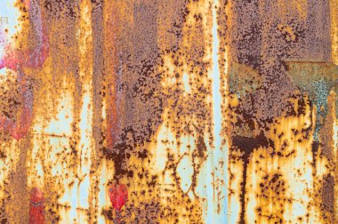 Demir üzerindeki eski ve hasarlı bir boyanın dokusu. Eski metalin dokusu. Pas.