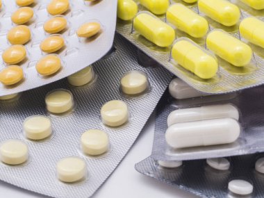 Capsules and tablets with their blisters