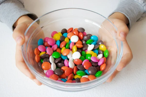Round, multi-colored candies. Candy close-up, in a glass container. — Stock Photo, Image