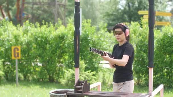 Young Beautiful Girl Shoots Flying Target Open Shooting Range Trap — Stock Video