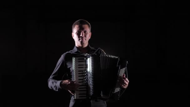 Young Accordionist Plays Accordion Masterly Studio Black Background Isolated — Stock Video