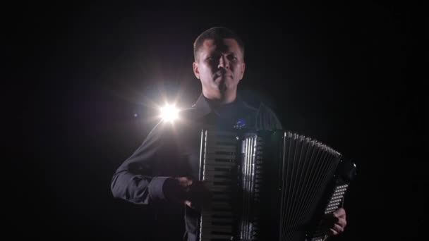 Accordionist Plays Accordion Masterly Studio Musician Black Background Light Close — стоковое видео