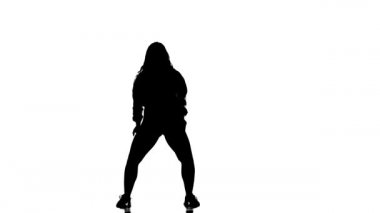 Profesyonel Hip Hop break dansçısı. Beyaz arka planda siyah bir siluet, şık ve genç bir kızın. Çağdaş koreografi. Düşük ihtimal