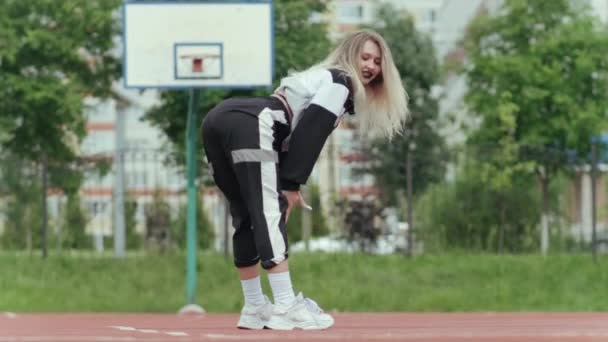 Young Cheerful Blonde Long Hair Tracksuit Dancing Street Modern Dance — Stock Video