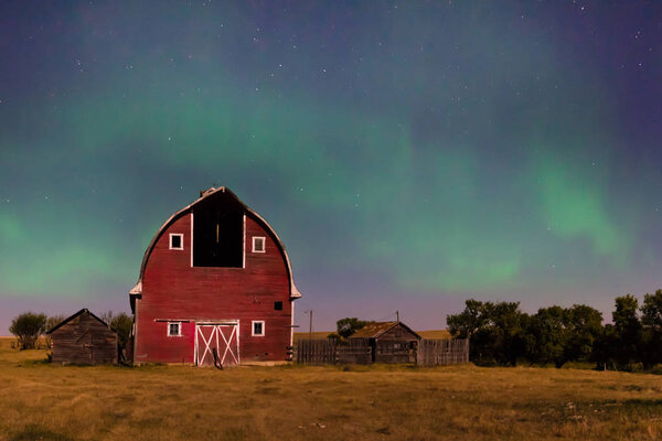 Northern Lights over vintage barn in Saskatchewan