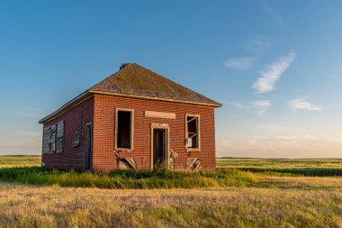 The abandoned Bissell, SK one-room schoolhouse near Simmie, SK established in 1913